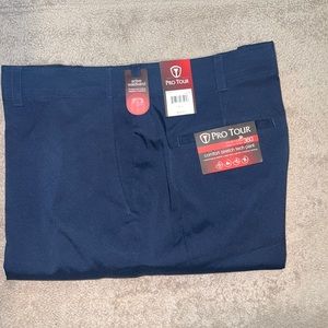 Pro Tour comfort stretch tech pants in black iris. NWT 40 by 30